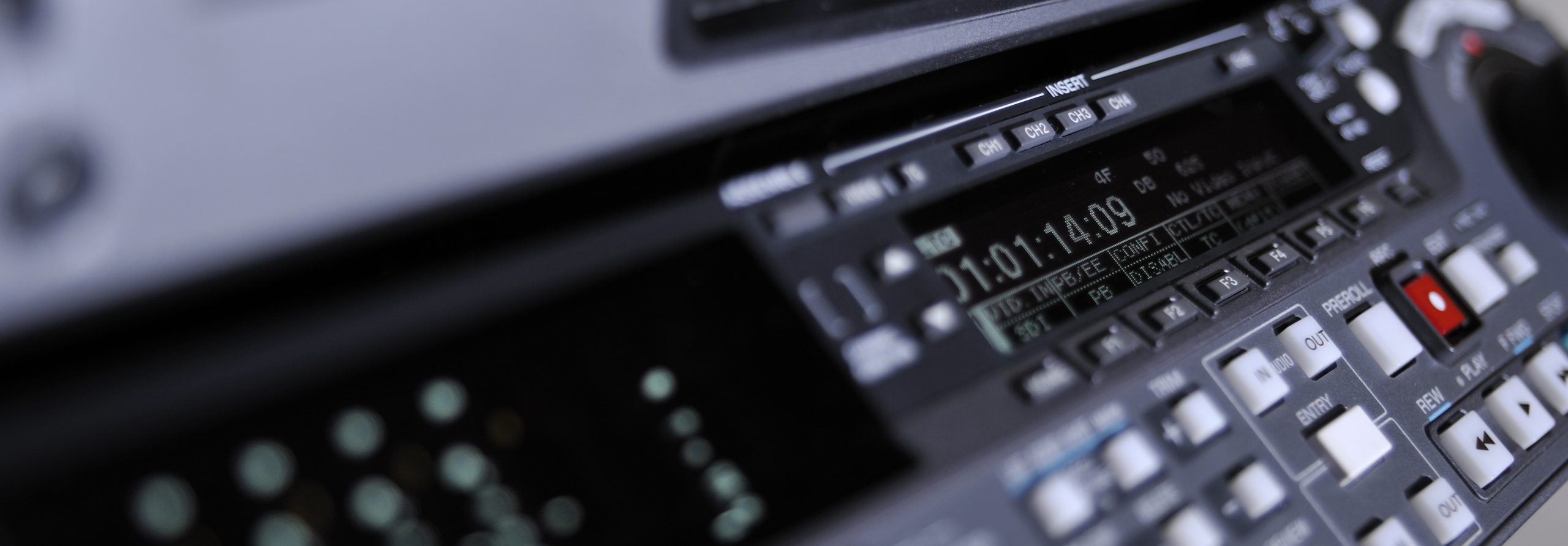 Close-up of the front panel of the digibeta recorder Close-up of the front panel of the professional digital betacam video recorder.
Shallow dof. Displays, equalizer, buttons.
